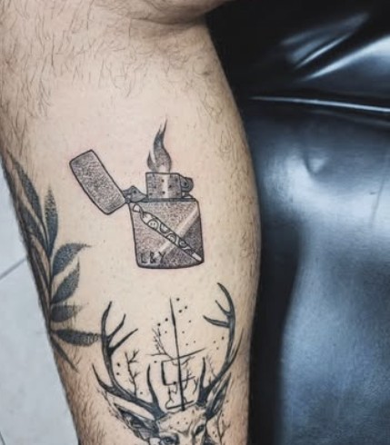 Lighter and deer tattoo