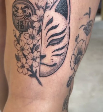 Kitsune mask and cherry blossom tattoo
