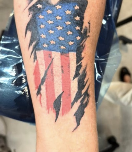 Distressed American flag tattoo