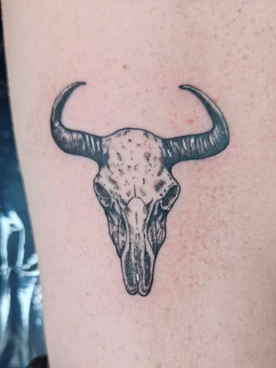 Black and grey bull skull tattoo by Yaciel